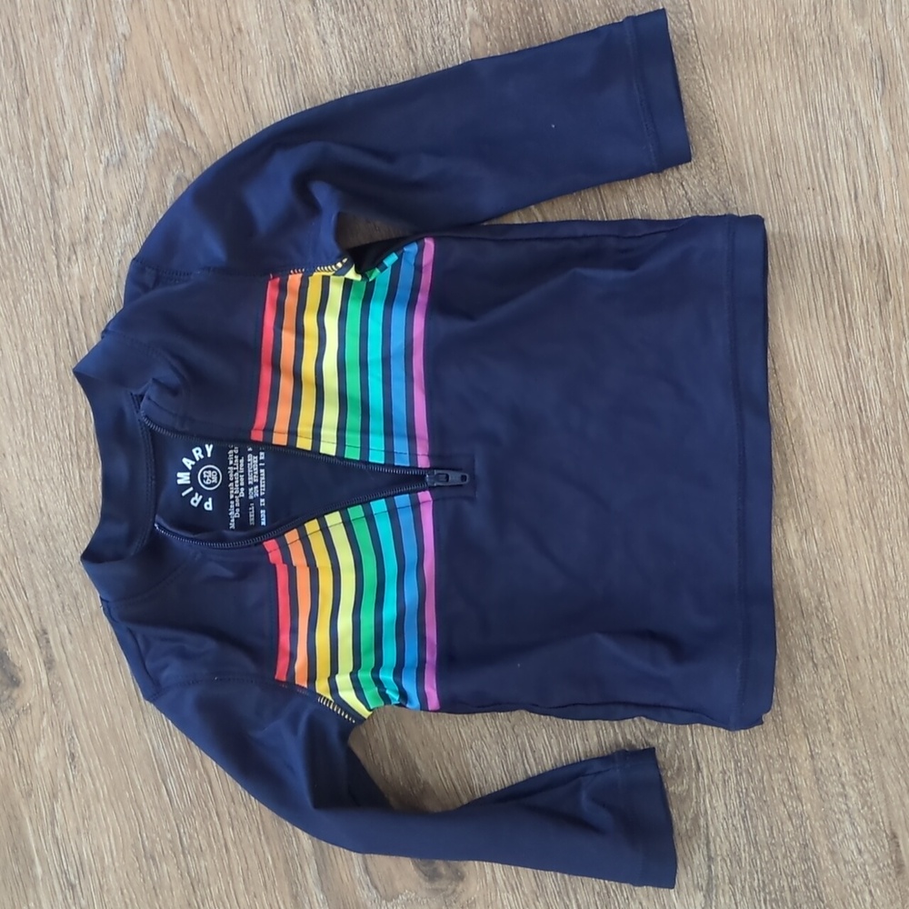Primary UPF50+ rashguard swim top navy with rainbow stripe size 6m-12m